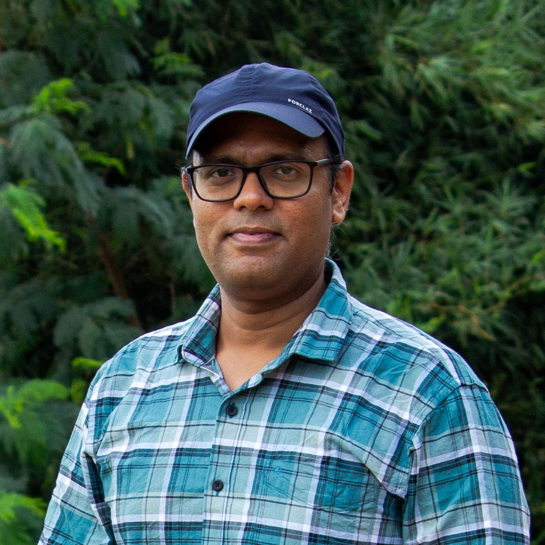 Saurabh smiling in studio
